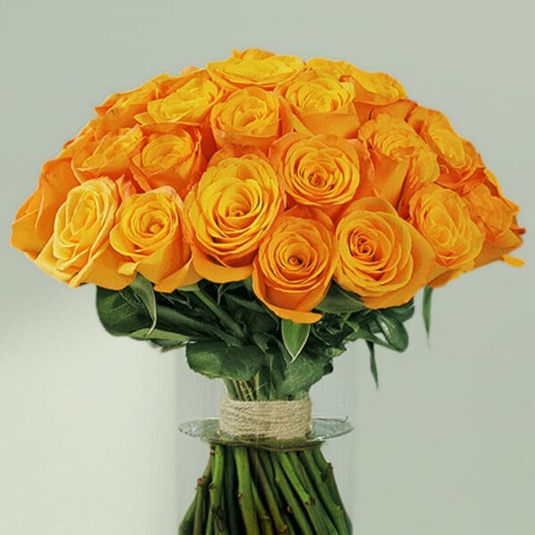 A bunch of orange roses in vase