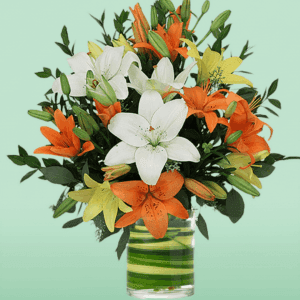 Mix Lily in Vase arrangement with fresh pink and white lilies elegantly displayed in a clear glass vase, perfect for home décor, celebrations, and thoughtful flower gifting.