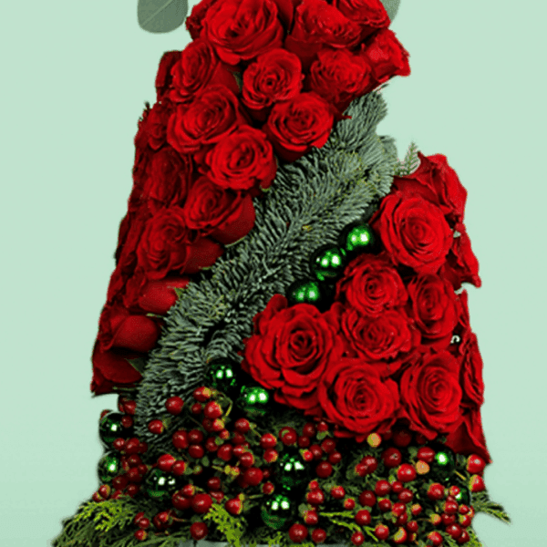 Christmas tree-shaped rose plant gift arrangement with festive red blooms, decorative wrapping, and holiday charm, perfect for Christmas celebrations and seasonal gifting.