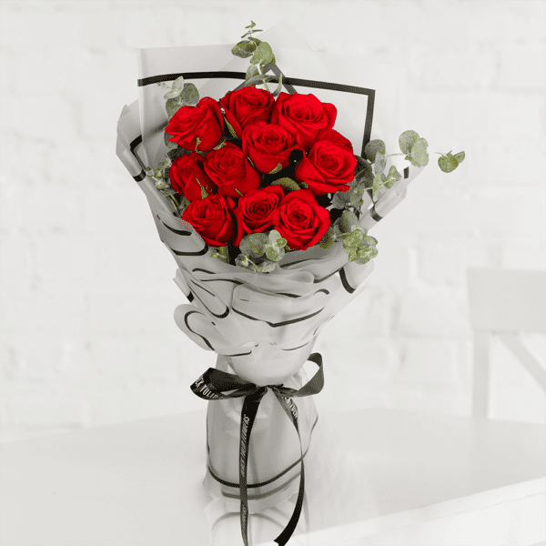 10 Red Roses Bouquet (2) Elegant 10 red roses bouquet wrapped in translucent cellophane