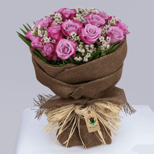 Elegance and Charm - purple rose bouquet with wax flowers