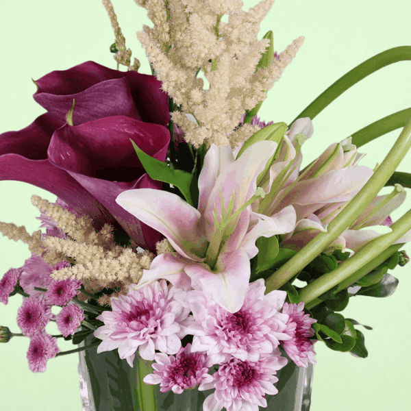 Premium floral centerpiece with lilies and astilbe arrangement