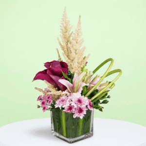 Premium floral centerpiece with lilies and astilbe arrangement