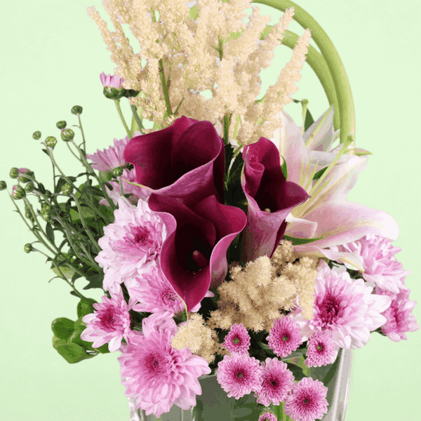 Premium floral centerpiece with lilies and astilbe arrangement
