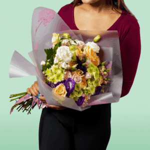 Colourburst Floral Symphony bouquet arrangement with vibrant roses, lilies, carnations, and seasonal blooms in a colorful luxury floral display.