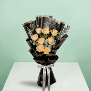 An elegant pink rose bouquet with eucalyptus wrapped with Korean Style Flower Wrapping Sheets