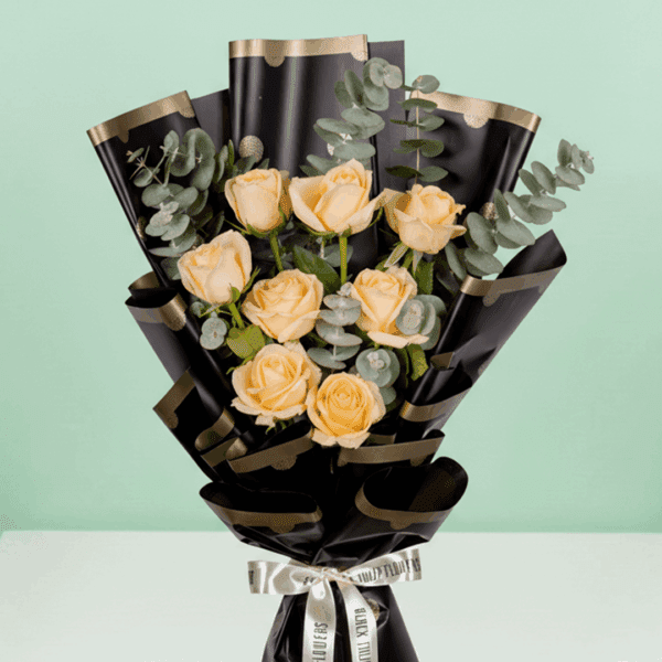 An elegant pink rose bouquet with eucalyptus wrapped with Korean Style Flower Wrapping Sheets