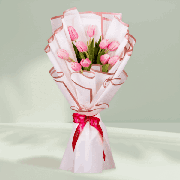 10 pink tulips bouquet wrapped in white Korean flower paper with pink ribbon