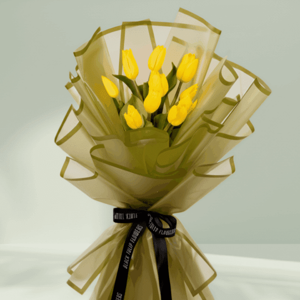 Golden Glow – 10 Stem Yellow Tulips (4) 10 yellow tulips bouquet wrapped in olive green Korean flower paper with black satin ribbon
