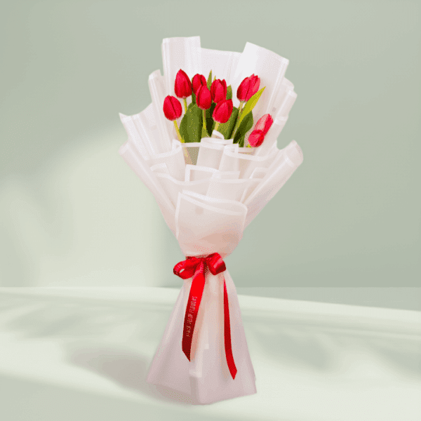 Ruby Grace – 10 Stem Red Tulips (3) 10 red tulips bouquet wrapped in white Korean flower paper with red satin ribbon