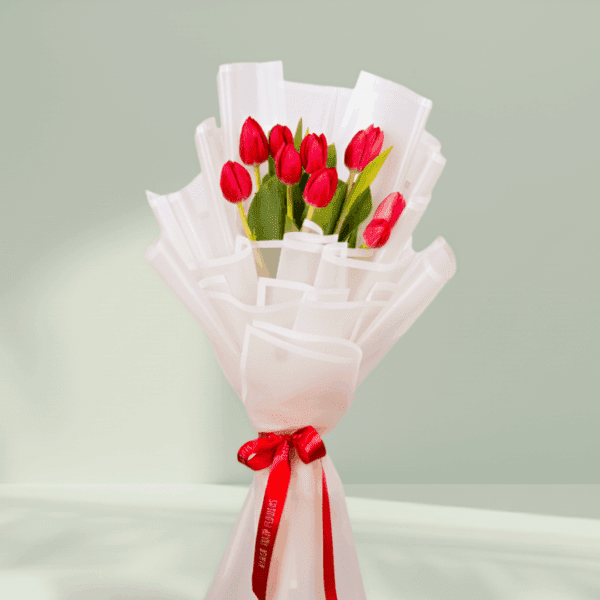 Ruby Grace – 10 Stem Red Tulips (4) 10 red tulips bouquet wrapped in white Korean flower paper with red satin ribbon