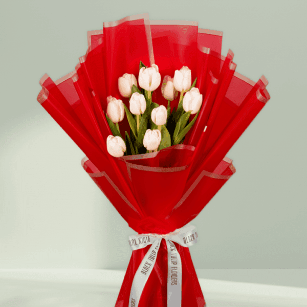Elegant white tulip bouquet wrapped in red Korean flower paper with satin ribbon