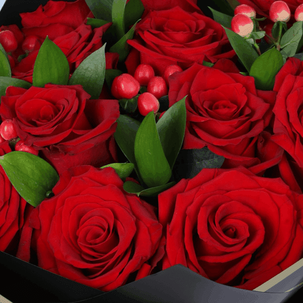 20 red roses with hypericum and green leaves wrapped in elegant Korean style flower sheets