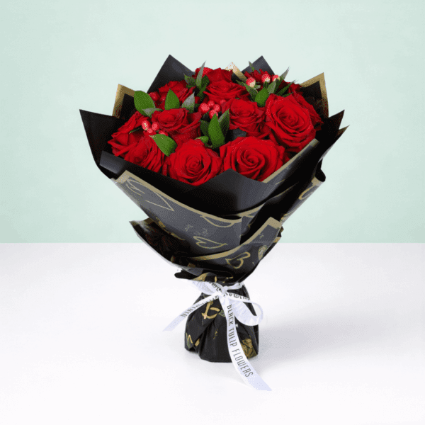 20 red roses with hypericum and green leaves wrapped in elegant Korean style flower sheets