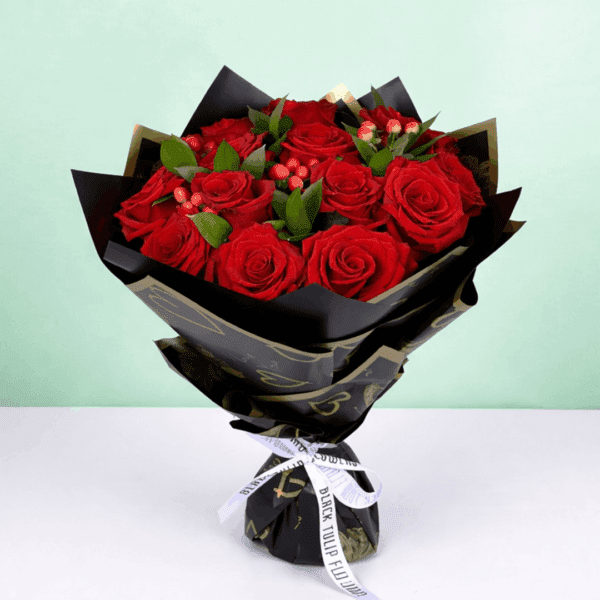20 red roses with hypericum and green leaves wrapped in elegant Korean style flower sheets