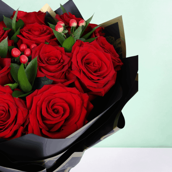 20 red roses with hypericum and green leaves wrapped in elegant Korean style flower sheets