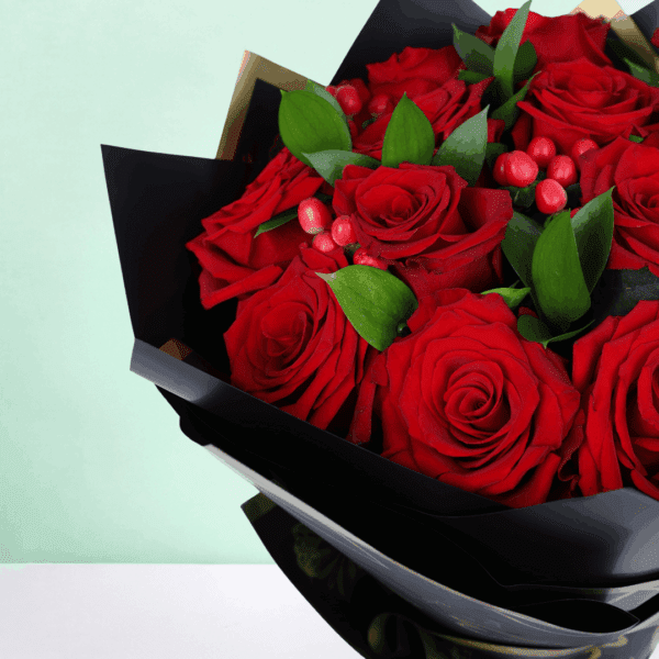 20 red roses with hypericum and green leaves wrapped in elegant Korean style flower sheets