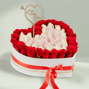 White heart-shaped box with 50–55 assorted roses and a Valentine topper