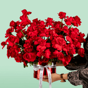 Valentine-themed flower box featuring red roses arranged in a luxurious circular design