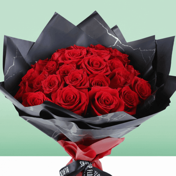 A stunning Valentine’s bouquet of 30 red roses, paired with fresh greenery and wrapped in chic Korean-style flower sheets.