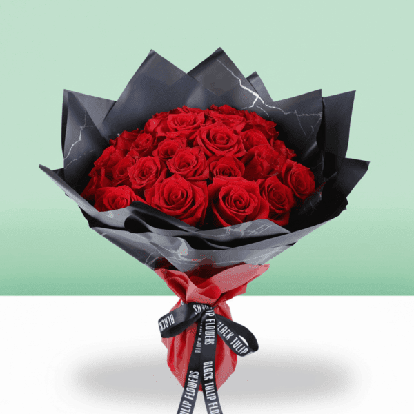 A stunning Valentine’s bouquet of 30 red roses, paired with fresh greenery and wrapped in chic Korean-style flower sheets.