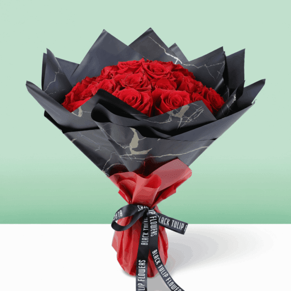 A stunning Valentine’s bouquet of 30 red roses, paired with fresh greenery and wrapped in chic Korean-style flower sheets.