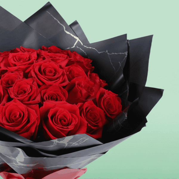 A stunning Valentine’s bouquet of 30 red roses, paired with fresh greenery and wrapped in chic Korean-style flower sheets.