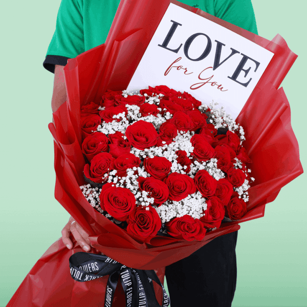 Red floral bouquet with roses and gypso, wrapped in Korean-style sheets, including a “Love for You” signature card