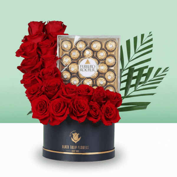 Vibrant red blooms presented in a stylish round box, paired with a chocolate surprise; an elegant gift that speaks straight from the heart.