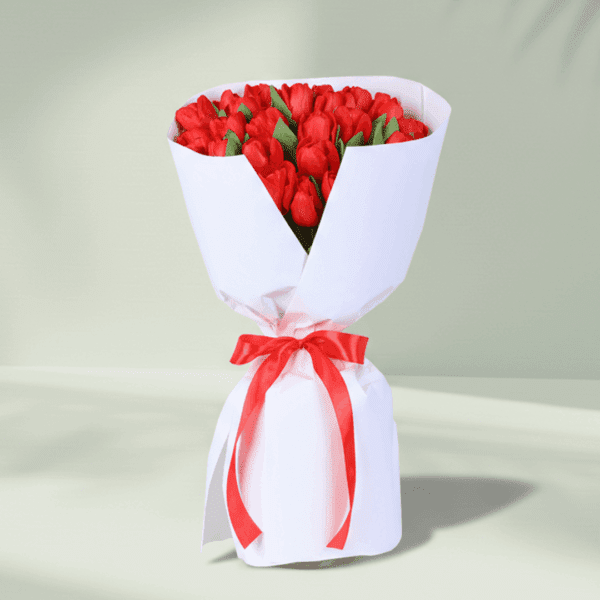 red-tulip-elegance-bouquet (5) "A vibrant bouquet of 30 red tulips, elegantly wrapped in soft non-woven paper"