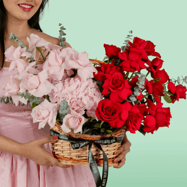 romantic_red_pink_flower_basket (1) Rectangle basket with red and pink roses, hydrangea, and eucalyptus in a soft rosy colour palette