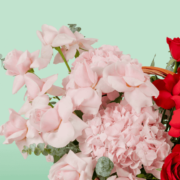 romantic_red_pink_flower_basket (3) Rectangle basket with red and pink roses, hydrangea, and eucalyptus in a soft rosy colour palette