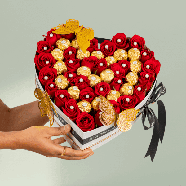 White heart-shaped flower box with 35 red roses, Valentine topper, and 20 Ferrero Rocher chocolates