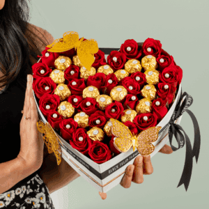 White heart-shaped flower box with 35 red roses, Valentine topper, and 20 Ferrero Rocher chocolates