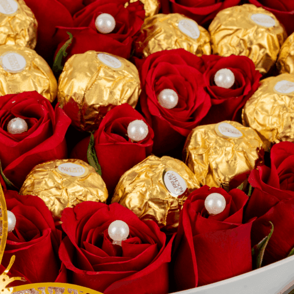 White heart-shaped flower box with 35 red roses, Valentine topper, and 20 Ferrero Rocher chocolates