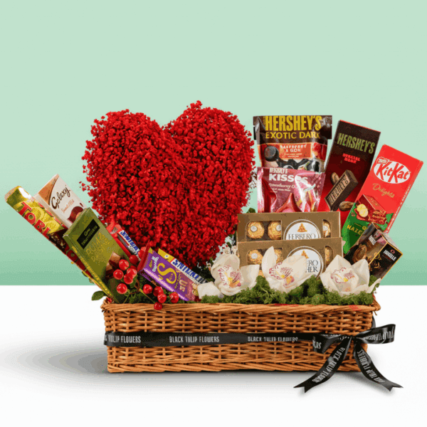 Box of red roses with 15 exotic chocolates arranged neatly in a rectangle basket with a bow tied.