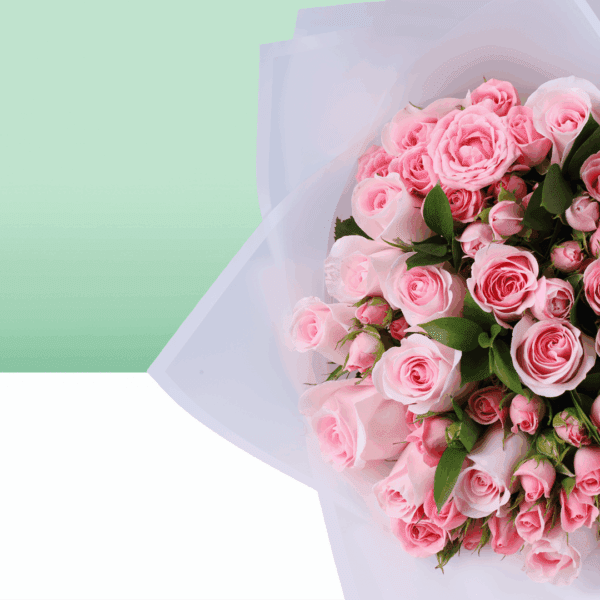 Fresh roses and spray roses bouquet with neat wrapping and a small Mother’s Day card attached