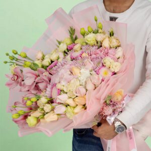 Designer flower bouquet featuring 40–50 premium stems of assorted blooms, wrapped in luxury Korean-style paper and tied with a satin ribbon.