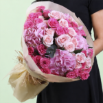 Premium pink dual flower bouquet featuring lush hydrangeas and classic roses arranged in a graceful floral design