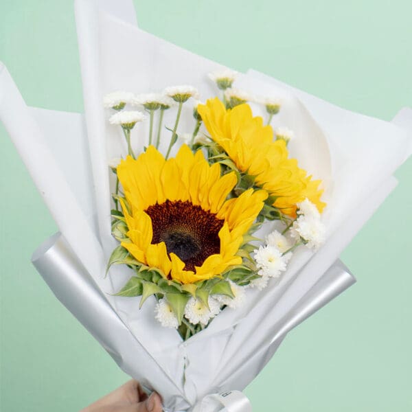 4-stem floral bouquet with sunflowers and chrysanthemums beautifully arranged in a stylish white Korean wrap with white satin.